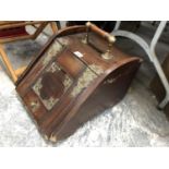 A VINTAGE MAHOGANY COAL SCUTTLE WITH BRASS BANDING