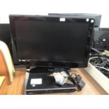 A 26 INCH TELEVISION WITH A TOSHIBA DVD PLAYER WITH REMOTE CONTROL IN WORKING ORDER