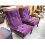 TWO PURPLE UPHOLSTERED RETRO ARMCHAIRS