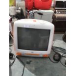 AN IMAC IN ORANGE COLOUR, WORKING (NEEDS DISK) W/O