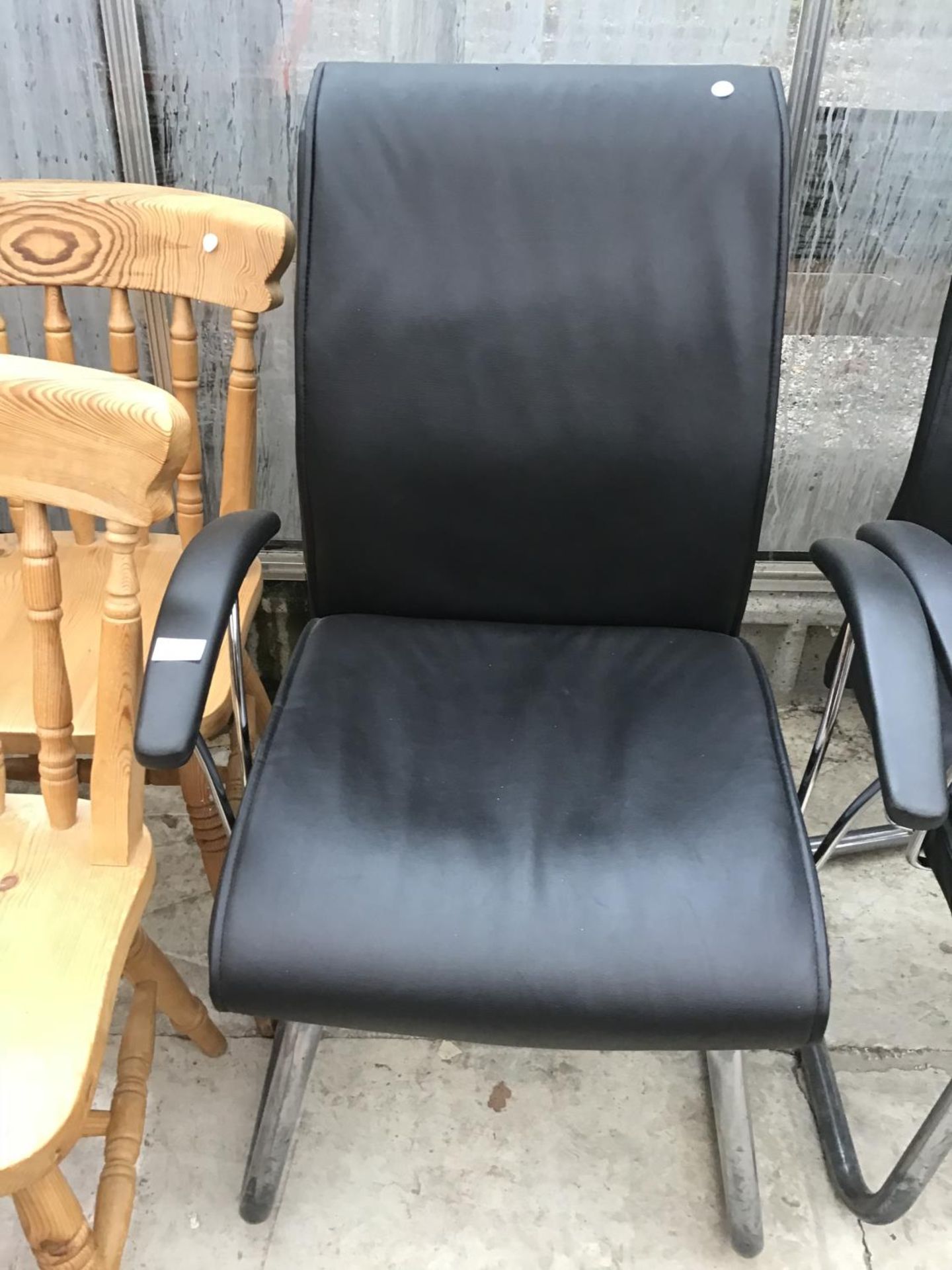 A SET OF FIVE BLACK LEATHERETTE WAITING ROOM ARMCHAIRS - Image 2 of 2