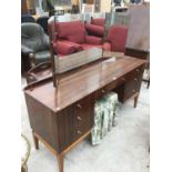 A ROSEWOOD EFFECT DRESSING TABLE WITH UPPER GLAZED MIRROR AND STOOL