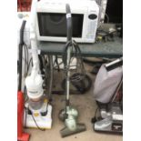 A HOME TEC LIGHT WEIGHT VACUUM CLEANER IN WORKING ORDER