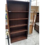 A TALL MAHOGANY BOOKCASE