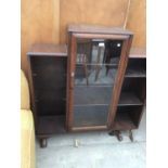 AN OAK DISPLAY BOOKCASE