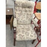 A VINTAGE FLORAL UPHOLSTERED ARMCHAIR