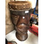 A VINTAGE TWO FACED WOODEN TRIBAL DRUM