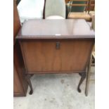 A MAHOGANY FALL FRONT CABINET