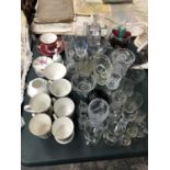 A LARGE GROUP OF ASSORTED GLASSWARE, CUPS ETC