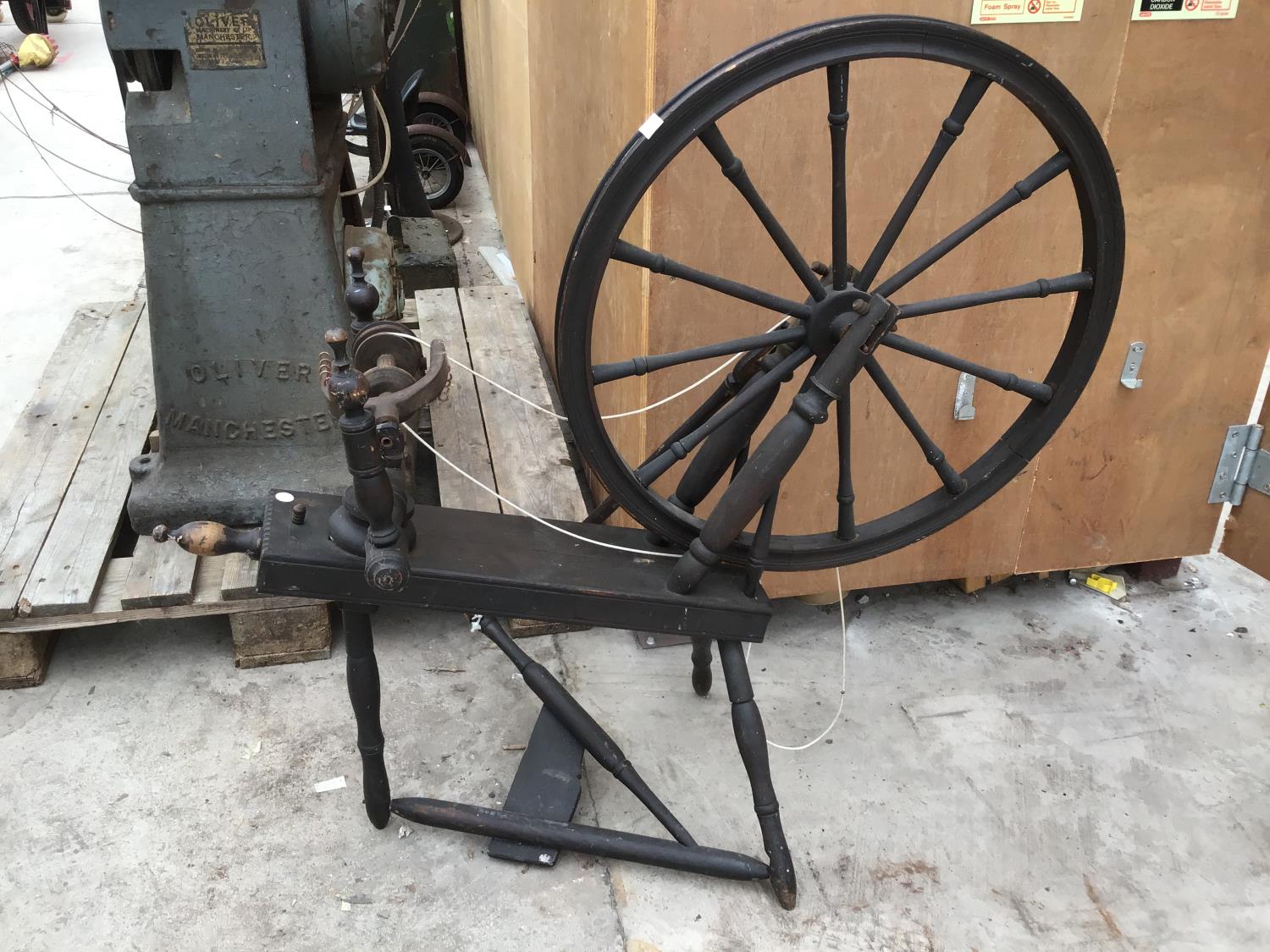 A VINTAGE SPINNING WHEEL