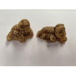 TWO ORIENTAL BUDDHA FIGURES