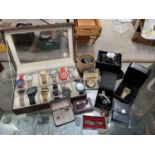 A LARGE COLLECTION OF ITEMS TO INCLUDE VARIOUS WRIST WATCHES TO INCLUDE 'ARMANI' , 'KAHUNA' ,