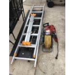 A WORKZONE SCAFFOLD AND LADDER SYSTEM WITH AN EXTENSION CABLE AND A VICTU CHAIN SAW FOR SPARE OR