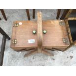 A VINTAGE OAK CONCERTINA SEWING BOX AND CONTENTS