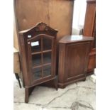 A MAHOGANY FREE STANDING CORNER DISPLAY CABINET