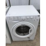 A HOTPOINT STYLE WASHING MACHINE IN WORKING ORDER