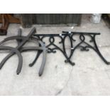 A PAIR OF CAST IRON BENCH ENDS AND A PAIR OF MODERN BENCH ENDS