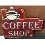 A METAL 'COFFEE SHOP' SIGN