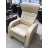 A STRESSLESS STYLE CREAM LEATHER ARMCHAIR