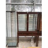 A MAHOGANY DISPLAY CABINET WITH UPPER GLAZED TWIN DOORS