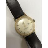 A GENTS VINTAGE INDEX 21 JEWELS DATE WATCH