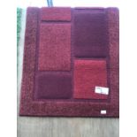AN AS NEW PATTERNED RUG 150CM X 80CM
