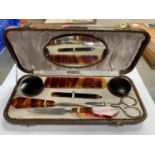 A CASED ART DECO PEDICURE SET