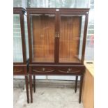 A MAHOGANY DISPLAY CABINET WITH UPPER GLAZED TWIN DOORS