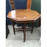 A WALNUT OCTAGONAL SIDE TABLE WITH CARVED GALLERY BASE