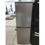 A LOGIK SILVER FRIDGE FREEZER IN WORKING ORDER