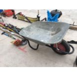 A GALVANISED WHEEL BARROW IN AS NEW CONDITION