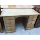 A PINE KNEEHOLE PEDESTAL DESK