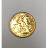 A 1925 GOLD HALF SOVEREIGN