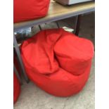 A LARGE GAMING CHAIR STYLE BEAN BAG WITH FOOT REST