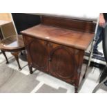 A MAHOGANY SIDEBOARD WITH LOWER DOORS