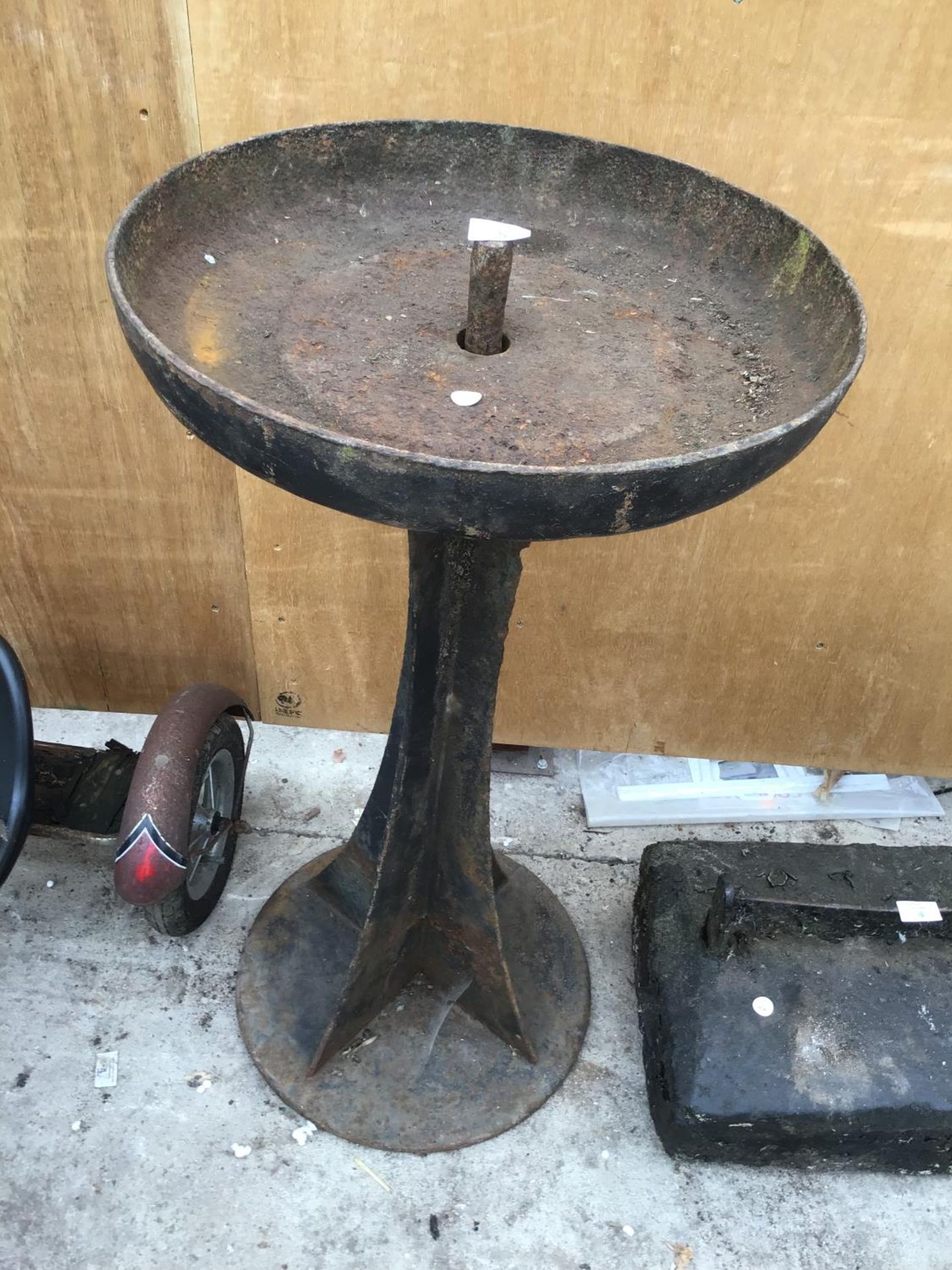 A CAST IRON BIRDBATH