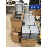 A LARGE QUANTITY OF PLASTIC STORAGE UNITS AND BOXES