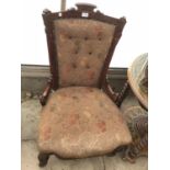 A CARVED WALNUT BEDROOM NURSING CHAIR