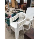 FOUR WHITE PLASTIC GARDEN CHAIRS, A WHITE PLASTIC RECLINING CHAIR AND TWO FOLD UP DECK CHAIRS ETC