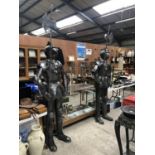 A PAIR OF DECORATIVE METAL FULL SIZE SUITS OF ARMOUR WITH AXES, HEIGHT TO TOP OF AXE - 248CM