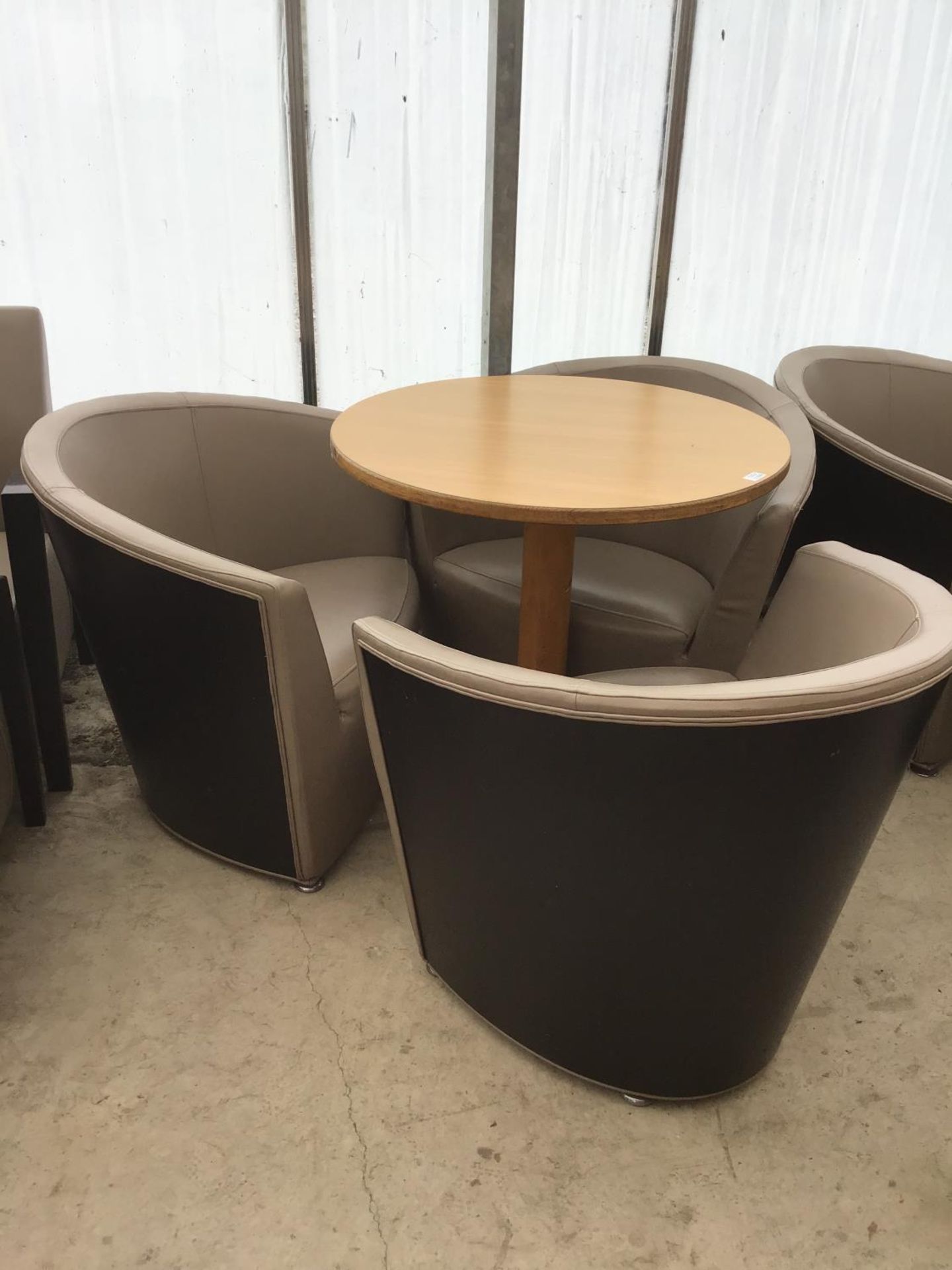 THREE MODERN TUB CHAIRS AND TABLE