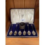 A SET OF HALLMARKED SILVER SPOONS AND SILVER NAPKIN RING