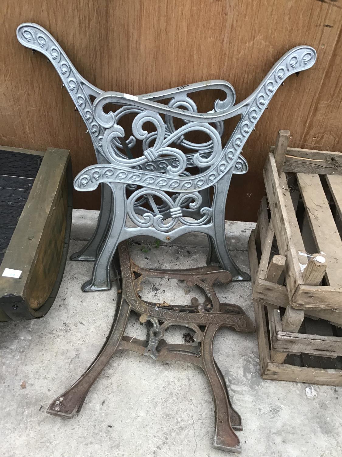 TWO PAIRS OF CAST IRON BENCH ENDS