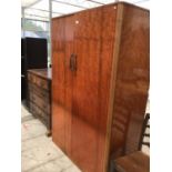 A MAHOGANY DOUBLE DOOR WARDROBE