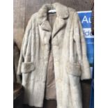 A VINTAGE LADIES LONG FUR COAT