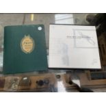 TWO STAMP ALBUMS , TO INCLUDE A VARIETY OF STAMPS FROM AROUND THE WORLD