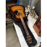 A YAMAHA 'F310' ACOUSTIC GUITAR AND CASE