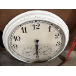 A LARGE ROUND WHITE METAL WALL CLOCK WITH TEMPERATURE GAUGE