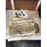 A COLLECTION OF VINTAGE NEWSPAPERS