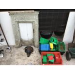 A VINTAGE CAST IRON FIREPLACE, A DRAIN TOP AND SEVERAL PLASTIC STORAGE BOXES